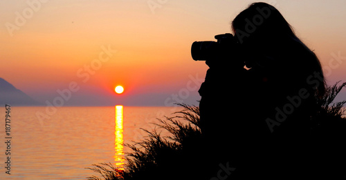 Photographer In Silhouette At Sunset Over Lake Geneva (Montreux) photo