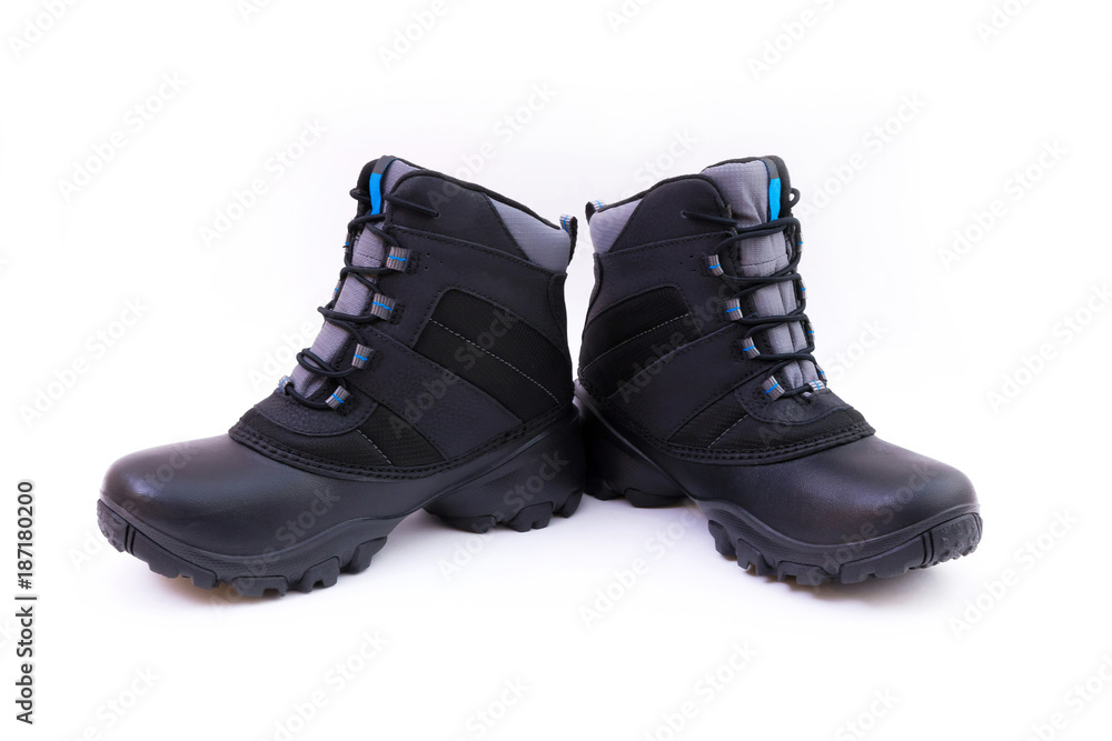 Black winter shoes. 
Pair of black winter shoes isolated on white background