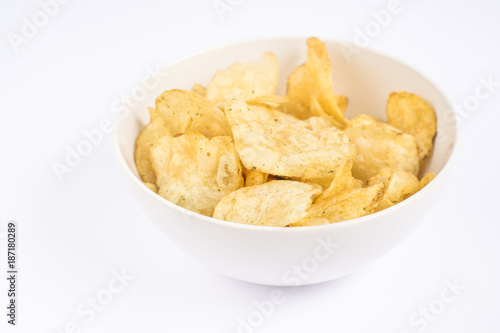 Simple potato chips on white background