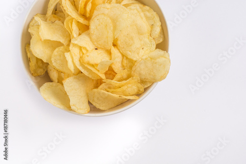 Simple potato chips on white background