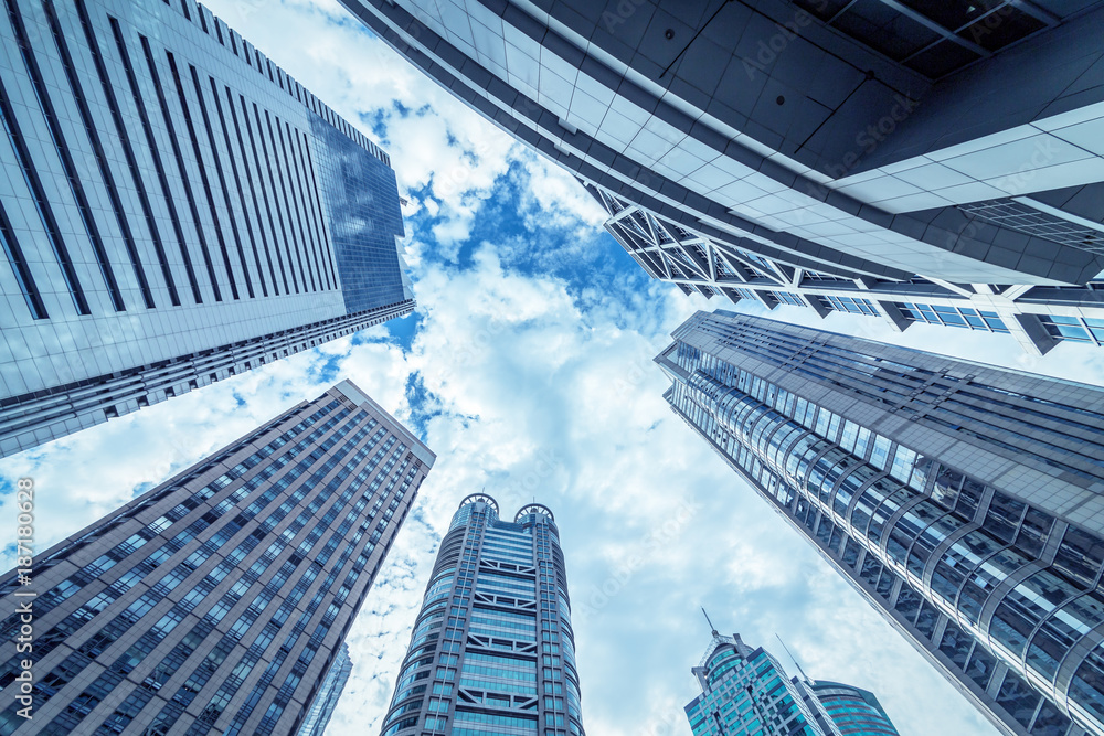 Fototapeta premium Looking up at business buildings in Lujiazui,Shanghai,China 
