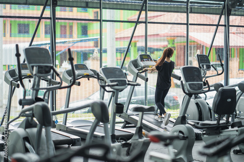 woman run on treadmill in the gym