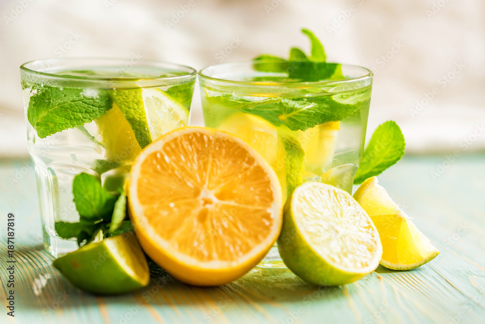 Lemonade or mojito cocktail with lemon and mint Lemonade or mojito cocktail with lemon and mint
