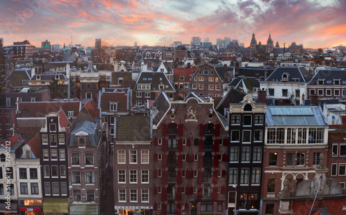 Roofs of Amsterdam at sunset,  Netherlands. Top view of old-time houses.