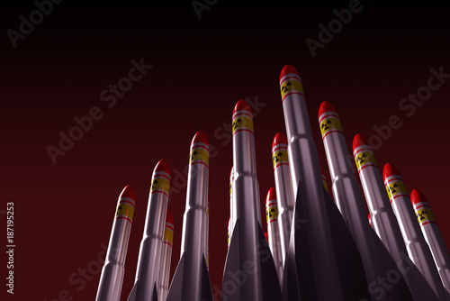 Combat rockets with the symbols of the atomic weapon displayed in a row. 3d illustration photo