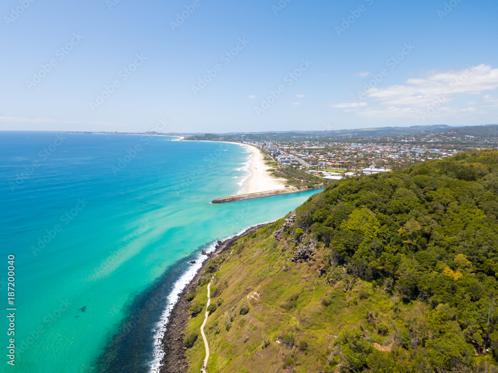 Fototapeta premium Tallebudgera creek and Burleigh Heads on the Gold Coast from an aerial perspective on a clear blue water day