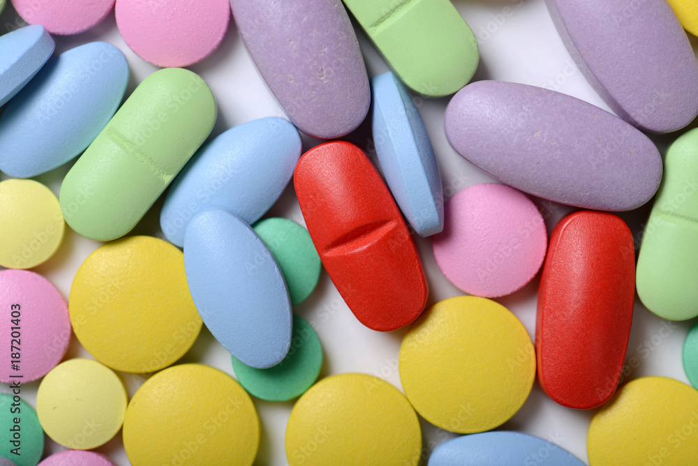 Pharmacy theme. Multicolored Isolated Pills and Capsules Pharmacy theme. Multicolored Isolated Pills and Capsules