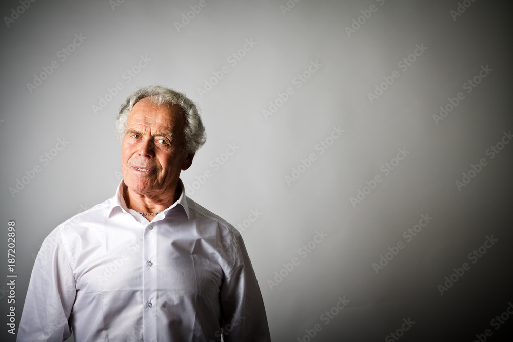 Strongman. Old man in white