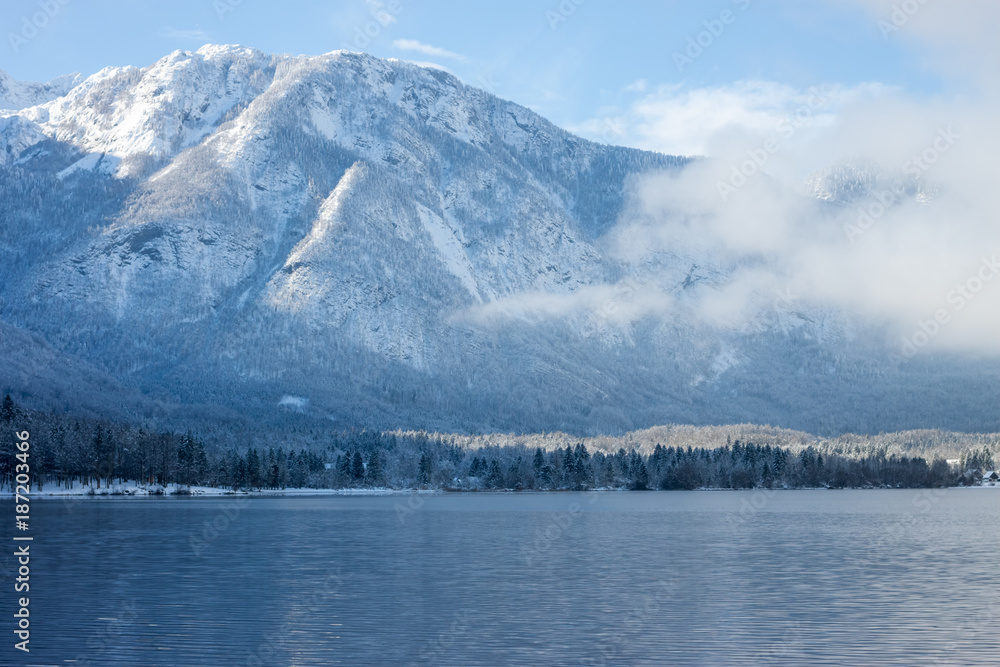 Mountains with snow over the lake