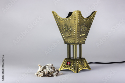 Golden censer incense burner isolated on white background