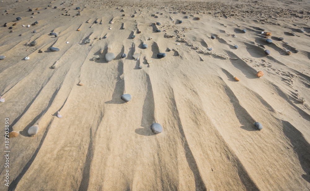 Fototapeta premium Stones and Drifts in Sand