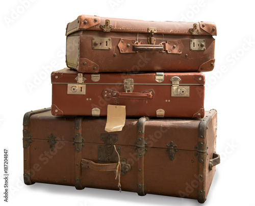 three old suitcases isolated on white background