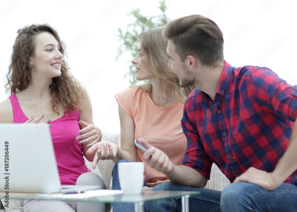 group of students to discuss the problem sitting on the couch. group of students to discuss the problem sitting on the couch.