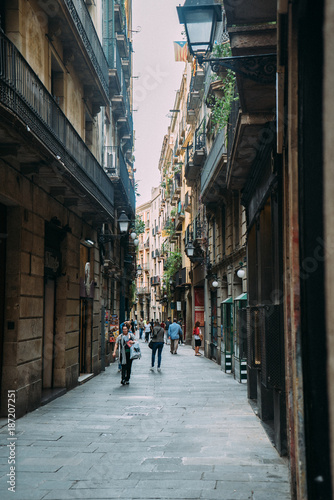BARCELONA  SPAIN - JUNE 30. The main street Via Laietana is the name of a major thoroughfare in Barcelona on June 30  2015. Lots of shops and main attractions are around the street