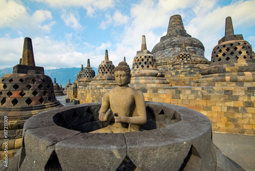 Buddha statue in Borobudur Temple - Java, Indonesia.