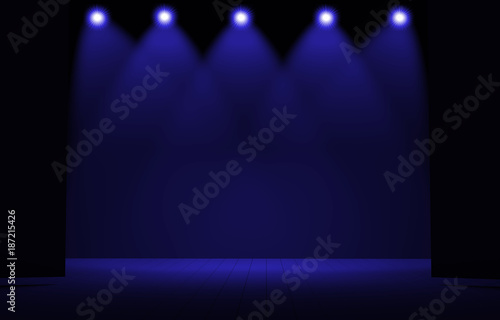 Stage lights ,free stage,concerrt stage .Several projectors on the ceiling. Spotlight strike through the darkness to the floor. photo