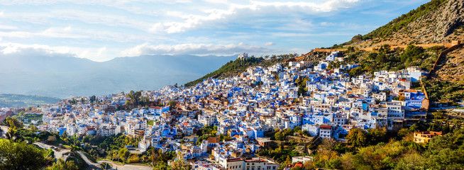 Stickers Marokko Blauwgeschilderde huizen van Chefchaouen  © dinozzaver