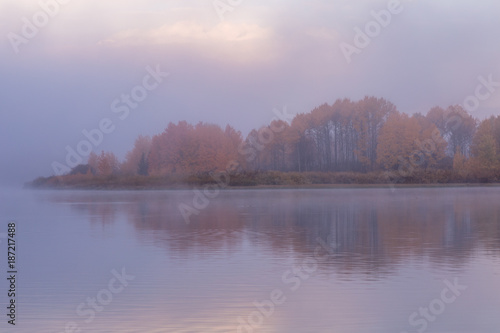 Foggy Sunrise Reflection in the Tetons in Autumn © natureguy