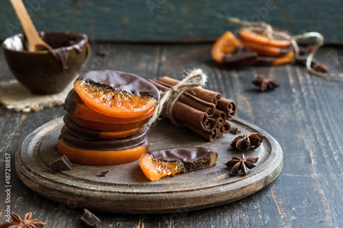 Christmas sweets, oranges in chocolate