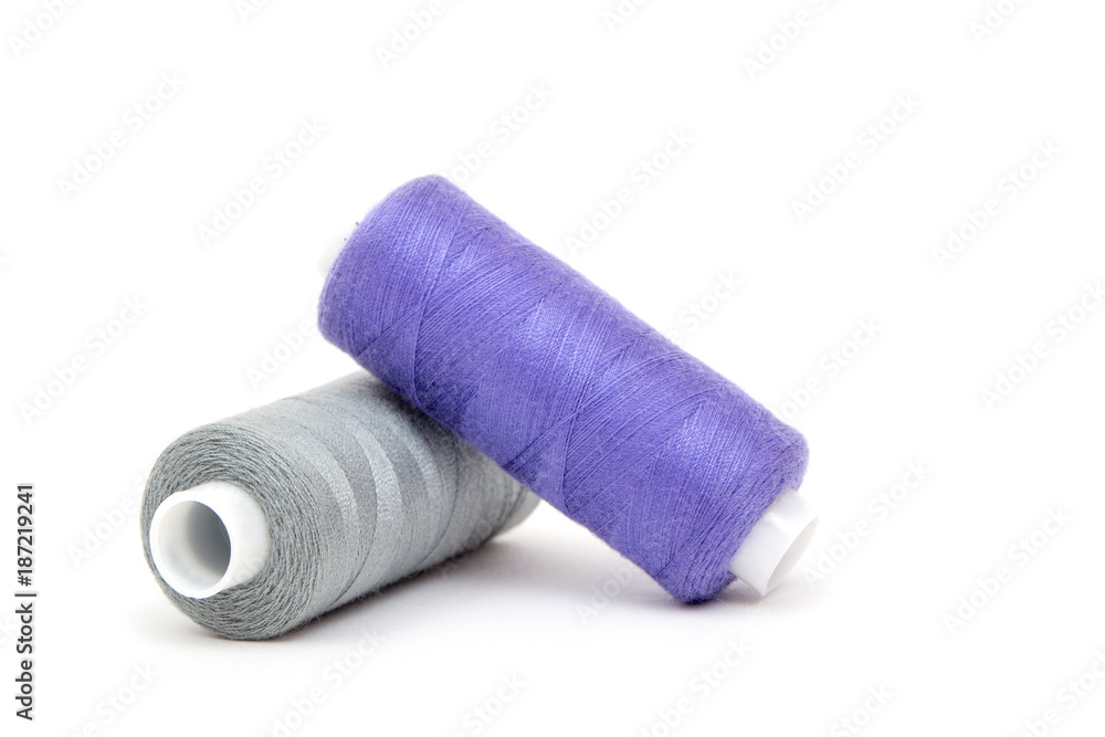 Set of colorful spools of thread isolated Set of colorful spools of thread isolated