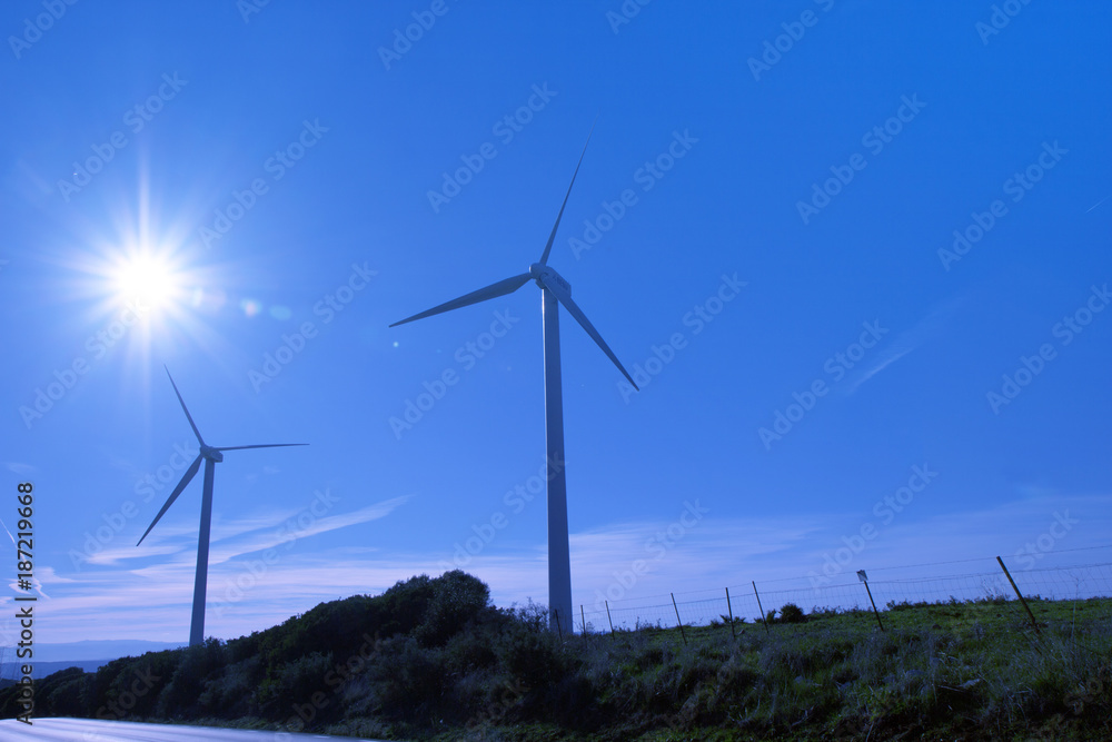 Wind turbines on the green hills of Andalusia Wind turbines on the green hills of Andalusia