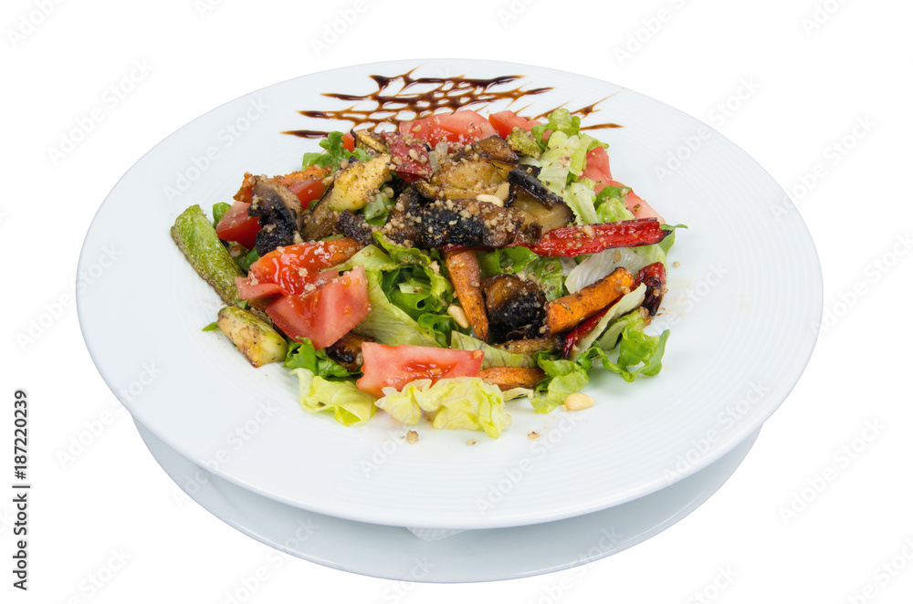 Salad. Vegetables baked on barbecue. On a white background. Salad. Vegetables baked on barbecue. On a white background.