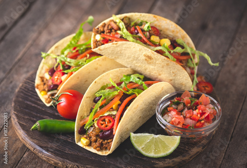 Mexican tacos with beef, vegetables and spices