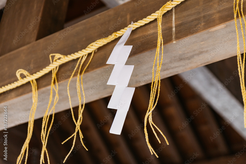 Shide is a zigzag-shaped paper streamer, often seen attached to shimenawa or tamagushi, and used in Shinto rituals. Shide is a zigzag-shaped paper streamer, often seen attached to shimenawa or tamagushi, and used in Shinto rituals.