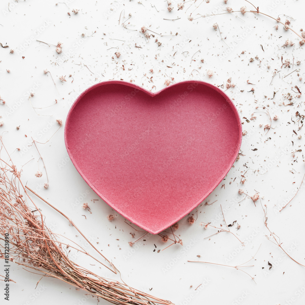 Heart shape with dry branch flower on white background. Heart shape with dry branch flower on white background.