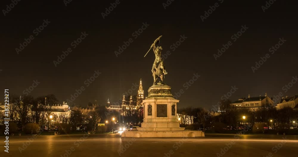 VIENNA, AUSTRIA – DECEMBER 2015 : Moving timelapse / hyperlapse of Erzhercog Karl statue at night with Rathaus / City Hall and Parliament in view VIENNA, AUSTRIA – DECEMBER 2015 : Moving timelapse / hyperlapse of Erzhercog Karl statue at night with Rathaus / City Hall and Parliament in view