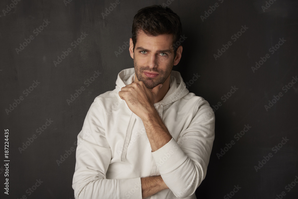 Handsome young guy thinking Handsome young guy thinking