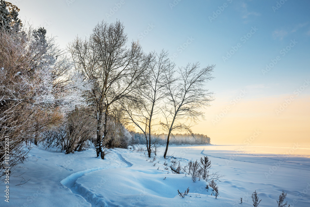 Winter landscape on the river. The river Ob, and the Ob reservoir, Novosibirsk, Siberia, Russia Winter landscape on the river. The river Ob, and the Ob reservoir, Novosibirsk, Siberia, Russia
