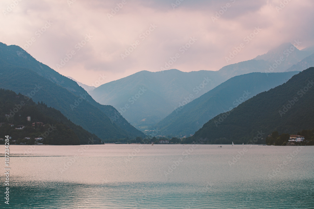 Italy view of a mountain lake lago di summer in cloudy weather