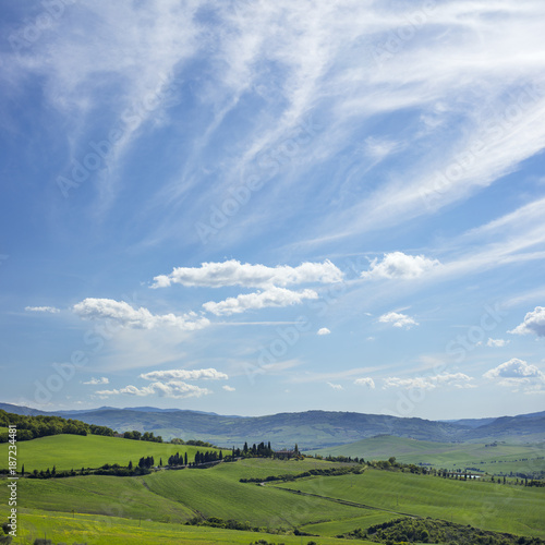 sky and clouds above tuscany valley in Italy