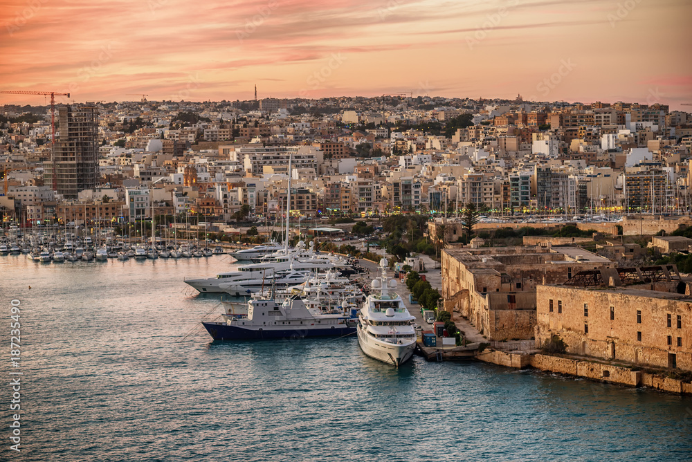 Malta: Manoel Island, Il-Gzira and Marsans Harbour. Aerial view from city walls of Valletta at sunset