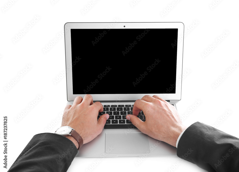 Young man using his laptop on white background Young man using his laptop on white background