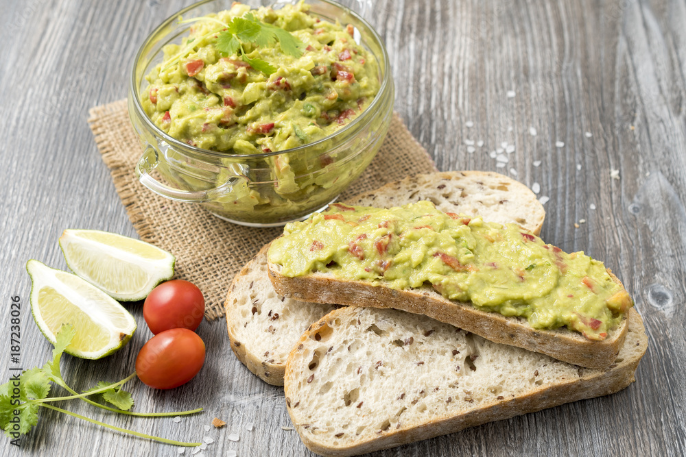 Bowl of guacamole with tortilla chips Bowl of guacamole with tortilla chips