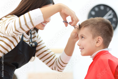 Female hairdresser working ...