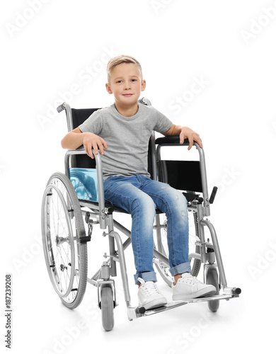 Little boy in wheelchair on...