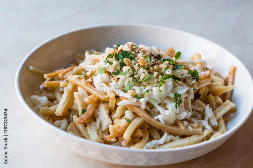 Turkish Noodle / Eriste with cheese, walnuts and parsley.