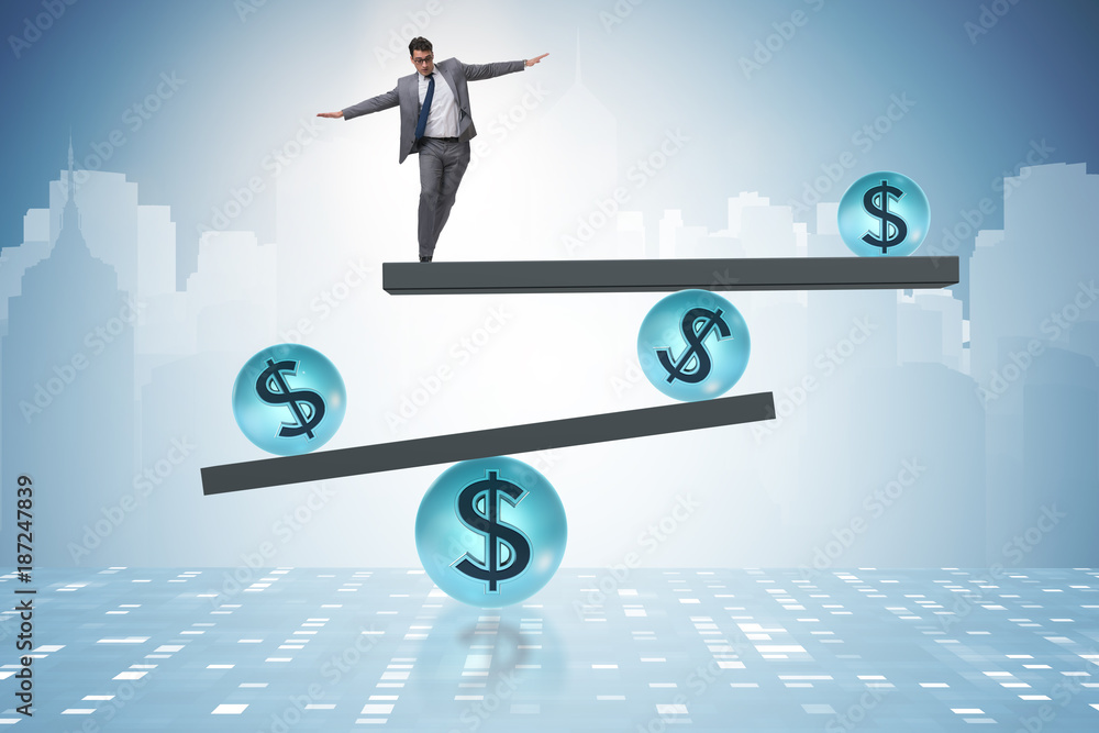 Businessman balancing in financial dollar concept Businessman balancing in financial dollar concept