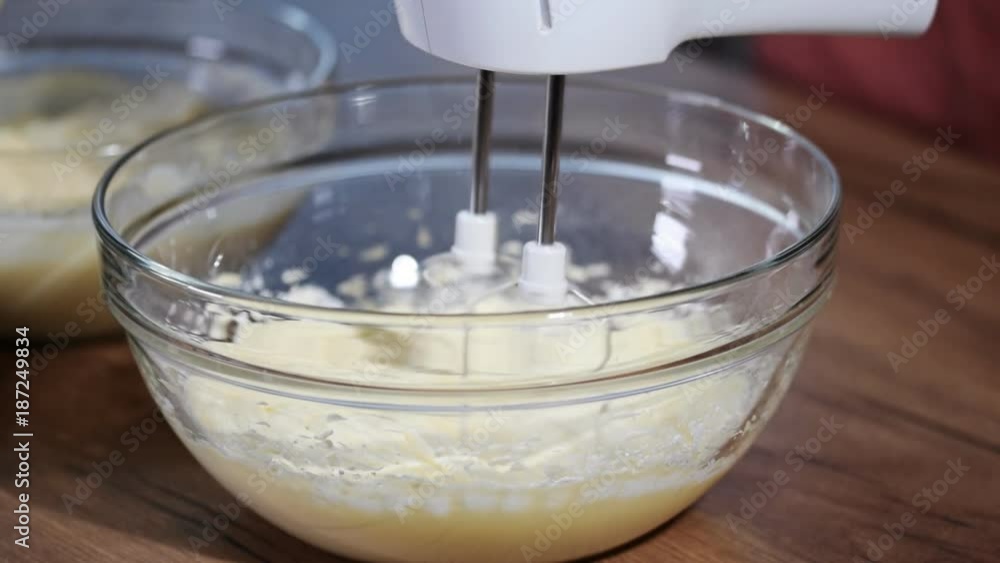 Butter being creamed with a mixer Butter being creamed with a mixer