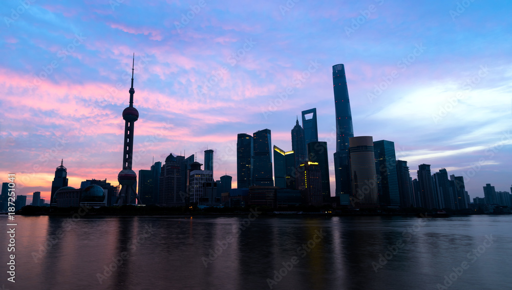 Sunrise twilight sky of Shanghai skyline Pudong building most prosperous urban groups of panoramic view in the morning. Shanghai China City scape of business district trade zone.