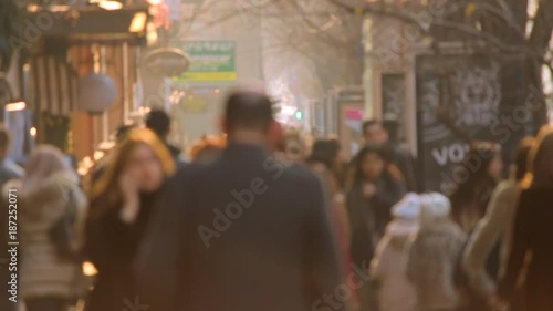 Wallpaper Mural Slow Motion. People walking on the background golden sunset in the city. Defocused video Torontodigital.ca