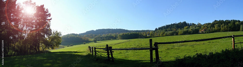 View of fences for horses, countryside, beautiful summer weather.