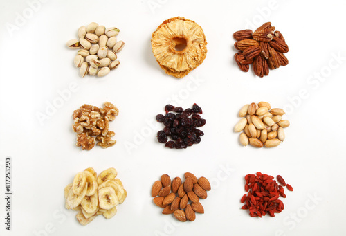 piles of Mixed dried fruits and nuts - symbols of jewish holiday Tu Bishvat