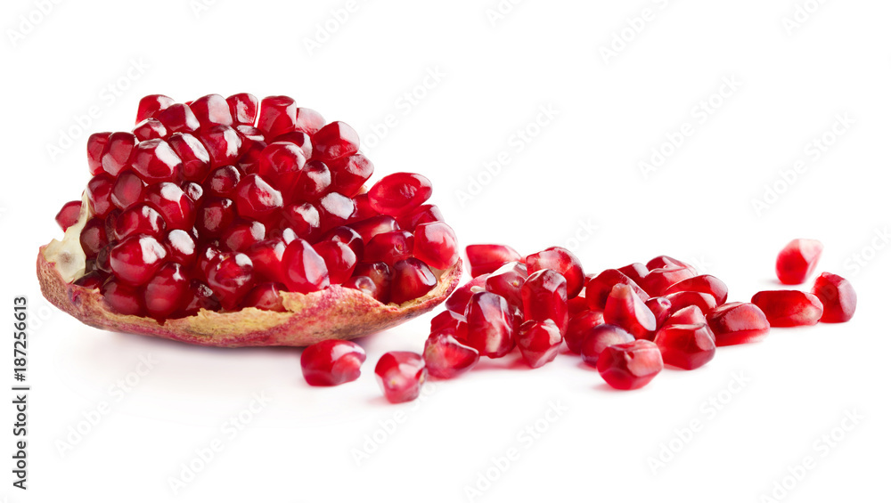 piece of ripe pomegranate with lot of seeds isolated on white background piece of ripe pomegranate with lot of seeds isolated on white background