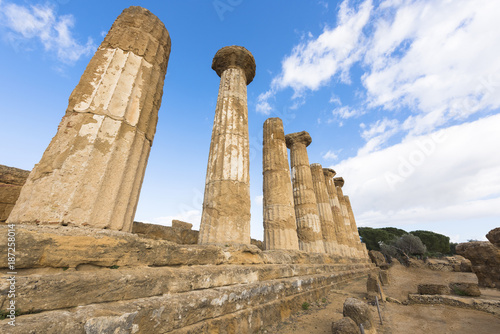 travel to Italy - Dorian columns of ancient Temple of Heracles (Tempio di eracle) in Valley of the Temples in Agrigento, Sicily photo