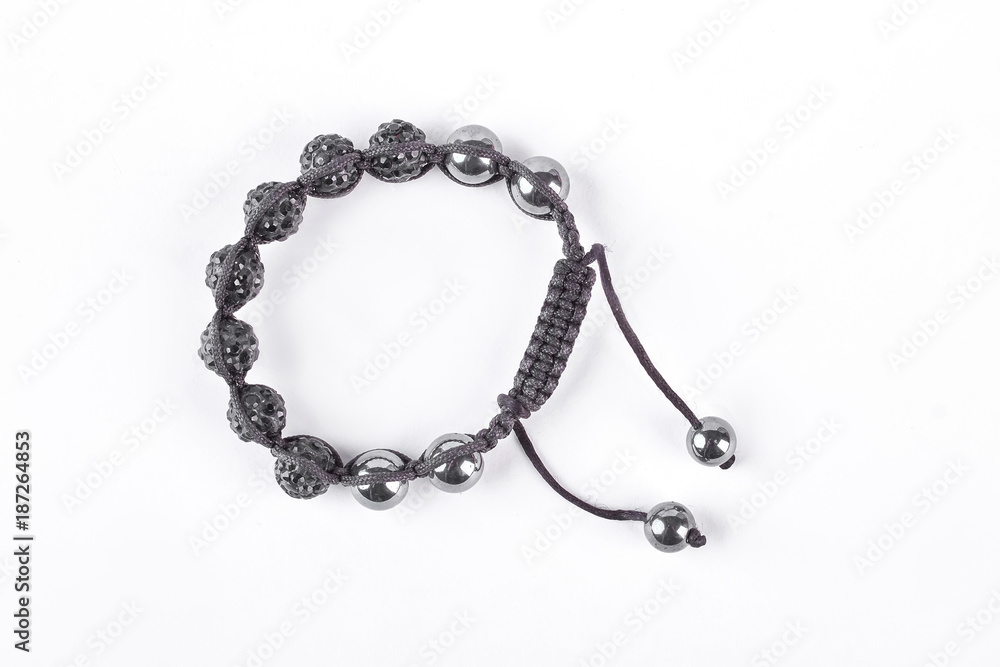 Shamballa bracelet isolated on white background. Buddhist bracelet shamballa with gems on a white background.