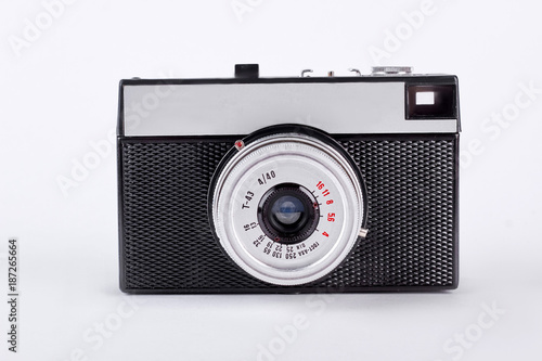 Old retro camera isolated on white background. Vintage film camera over white backgound.